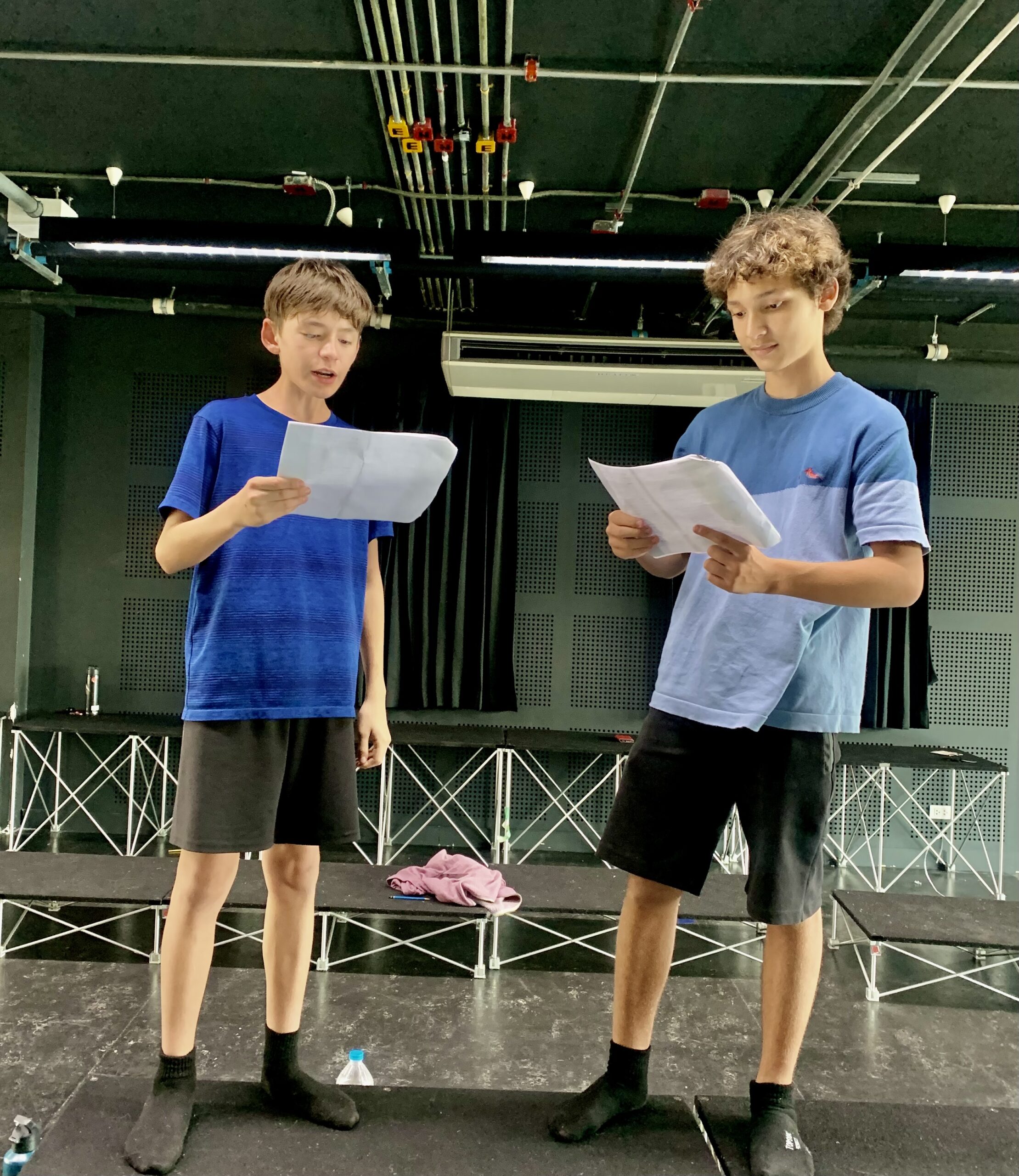 Two young drama students rehearsing in a scene-study workshop 